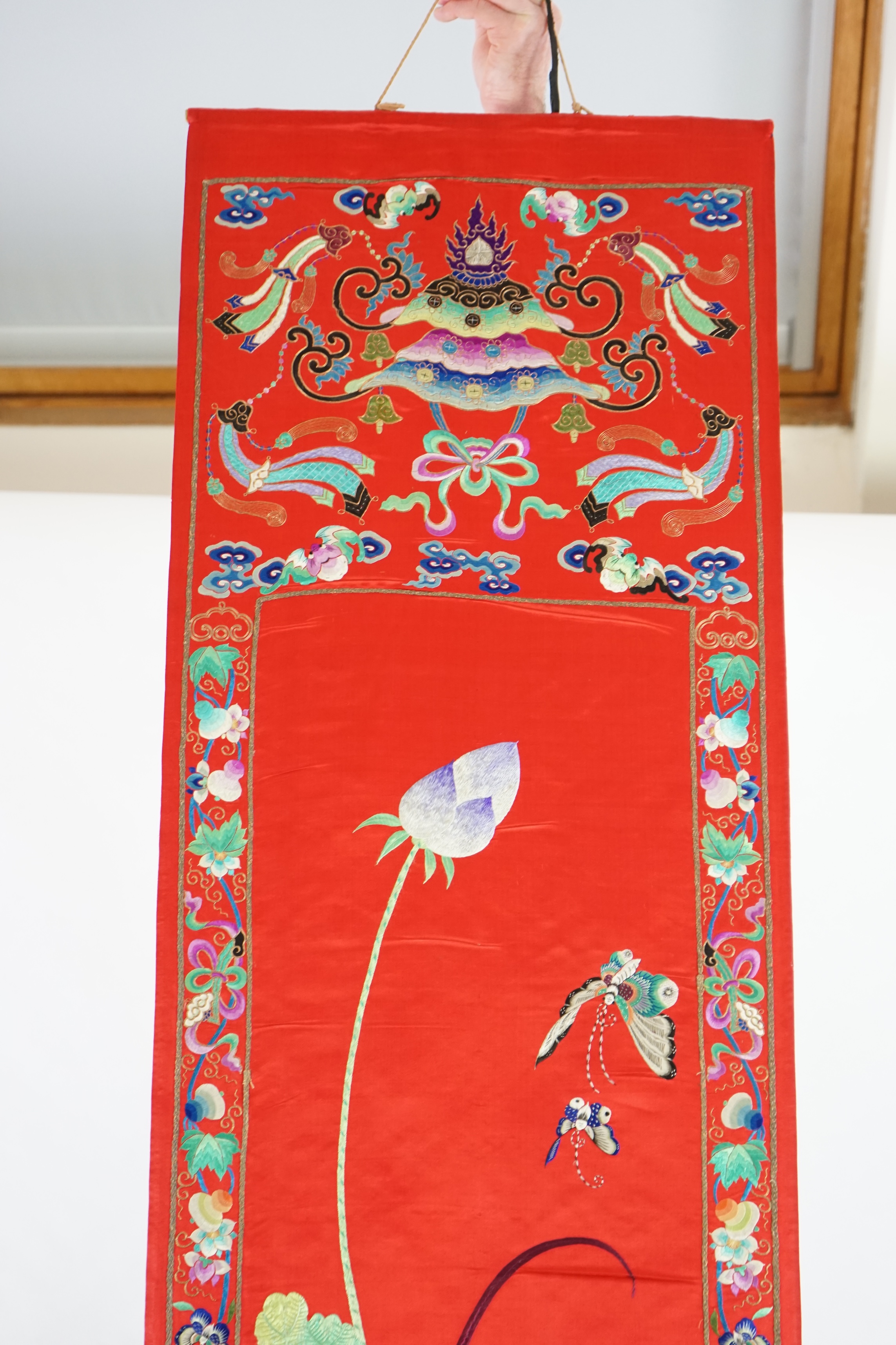 A Chinese embroidered silk wall hanging, early 20th century